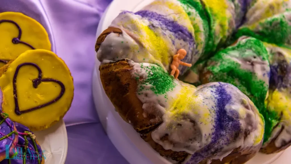 Rolling out the dough for King Cake on a floured surface.