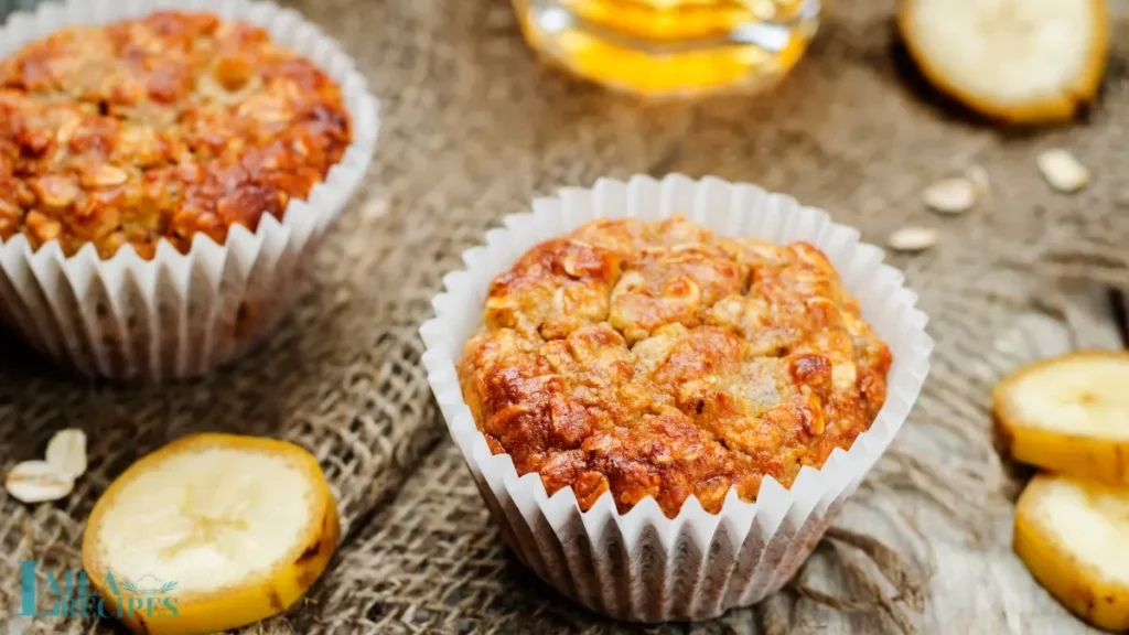 Mini muffin tin filled with banana oat batter ready for baking.