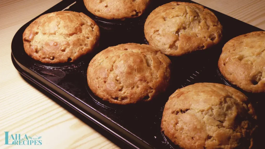 Muffin tin filled with batter before baking.