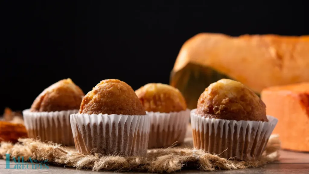 Ingredients for pumpkin muffins laid out on a countertop.